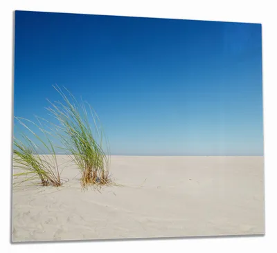 Produktbild von Wallario Herdabdeckplatte aus Glas, Größe 60 x 52 cm 1-teilig, Motiv Sandstrand unter blauem Himmel