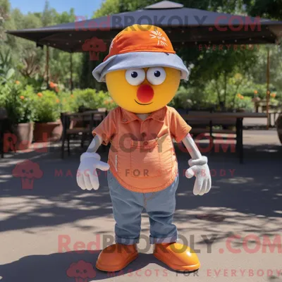 Productafbeelding van Mascottefiguur REDBROKOLY van een oranje petanquebal gekleed met een Chambray-shirt en hoofdbanden
