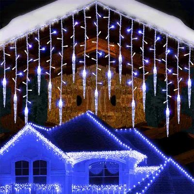 Icicle lights and string lights decorating the exterior of a house during the holiday season.