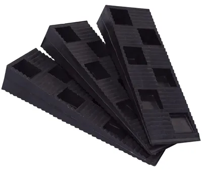 Zdjęcie produktu dla Czarny, plastikowy, żebrowany klin o wymiarach 90 x 30 x 15 mm, 20 sztuk, do wypoziomowania
