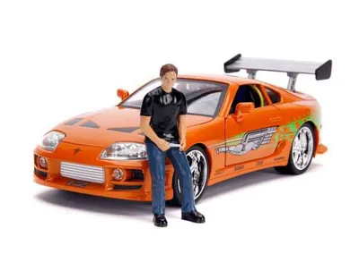 Immagine prodotto di Jada Toys Fast & Furious 1995 Toyota Supra con figura di Brian e funzione di illuminazione JADA31139