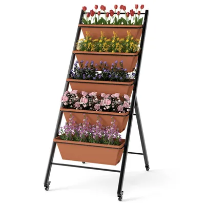A vertical planter with five tiers of flowers, set against a white background.