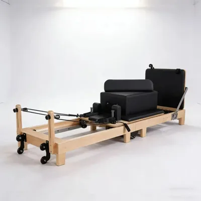 Immagine prodotto di Attrezzo Pilates Reformer - Telaio in legno - Resistenza regolabile - Non pieghevole - Carico massimo 500 kg - Nero
