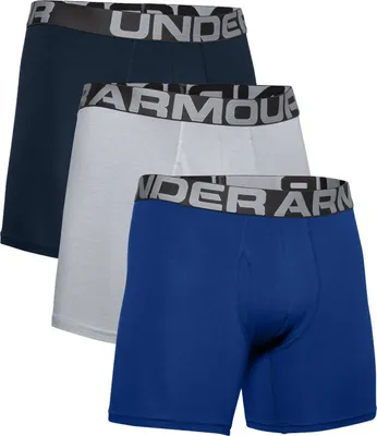 Three pairs of boxer shorts are stacked on top of each other.