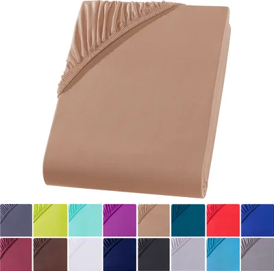 A close-up, angled view of a fitted sheet in a nougat color, with a row of color swatches below.