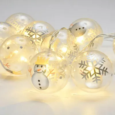 Immagine prodotto di ACA Lighting Lampade di plastica con pupazzi di neve, 10 LED decorativi a batteria (3xAA), WW, IP20, 135+30cm, cavo trasparente X061011247