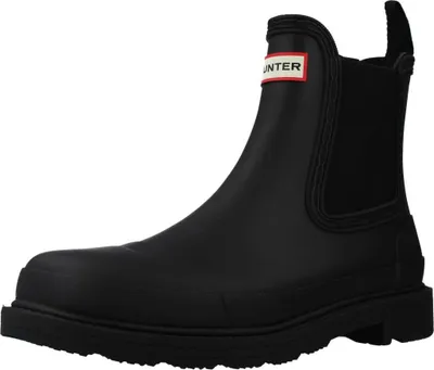 A black Chelsea boot with a red and white logo tag.