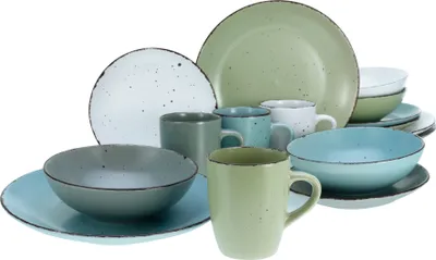 A collection of stoneware dishes and mugs in various pastel colors.