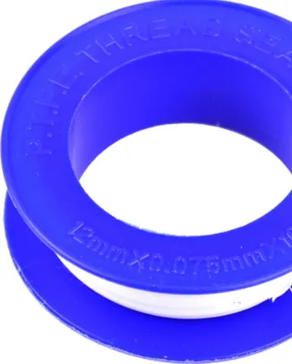A close-up shot of a roll of Teflon tape on a white background.