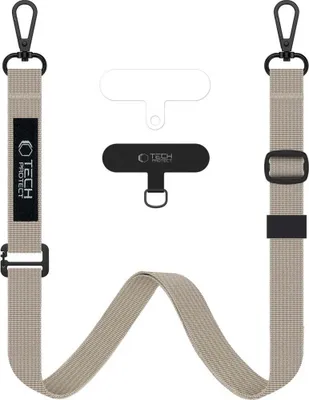 A flat lay of a crossbody phone strap and accessories on a white background.