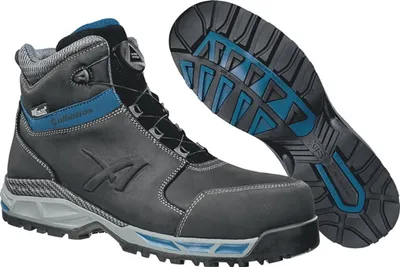 A pair of black and blue work boots, with one boot shown from the side and the sole of the other boot shown from underneath.