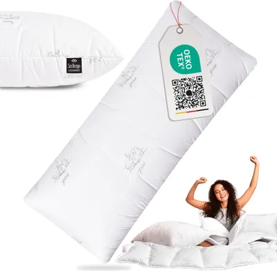 A pillow is shown in a studio setting with a woman waking up and stretching.