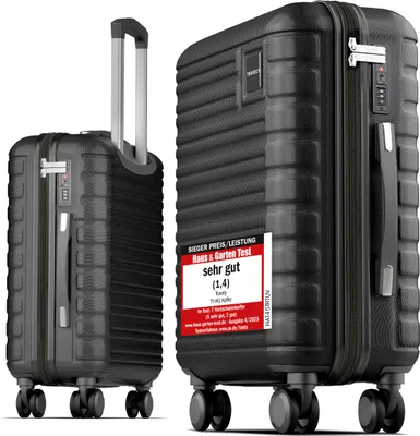 Two black suitcases, one upright and one on its side, with a marketing sticker on the side of the upright suitcase.