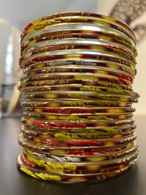 Immagine prodotto di Set di braccialetti diametro 6,7 cm multicolore