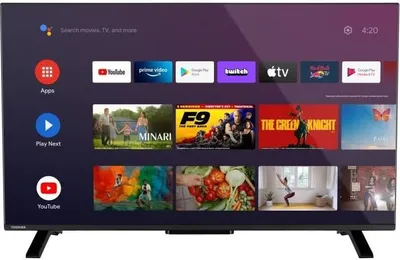 A Toshiba smart TV displaying its home screen with various app icons and movie posters.