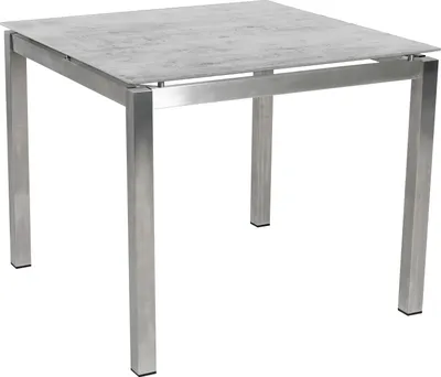 A square outdoor dining table with a stone-like top and silver metal legs, shown against a white background.
