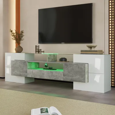 A modern TV stand with LED lighting in a living room setting.