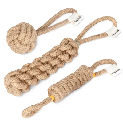 Three dog rope toys arranged diagonally on a white background.