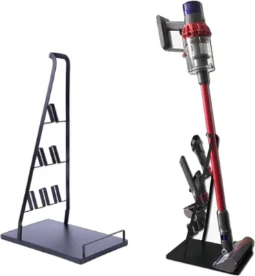 Two vacuum cleaner stands are shown against a white background. One stand is empty and black, while the other is black and holds a red and gray vacuum cleaner with accessories.