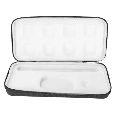 An open black carrying case with white foam interior, designed to hold a keyboard and accessories.