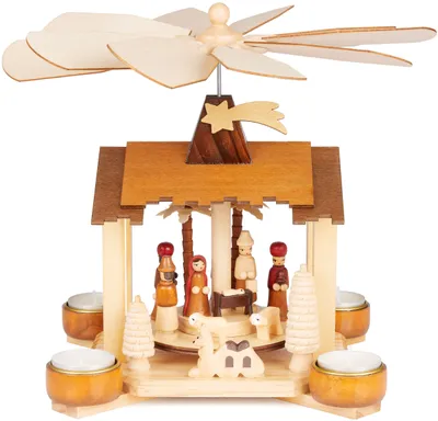 A wooden Christmas pyramid with a nativity scene.