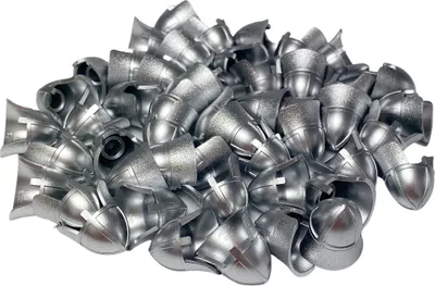A pile of silver knight helmets.