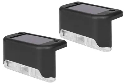 Two black solar-powered outdoor lights with clear plastic bases are shown against a white background.