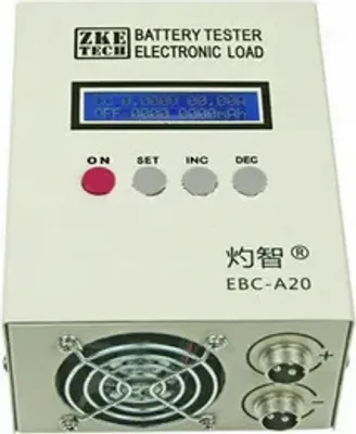 A white electronic battery tester with a display screen and buttons.