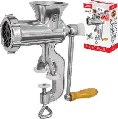A manual meat grinder with a clamp and a packaging box in the background.