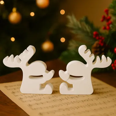 Produktbild von 2 Silikonformen eines Elchs mit herzförmiger Schleife für DIY-Weihnachtsprojekte, Gipsabgüsse