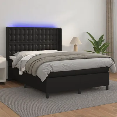 A black boxspring bed with a tufted headboard and LED lighting is shown in a bedroom setting.