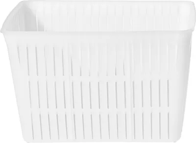 A white plastic cheese mold with a slatted design.