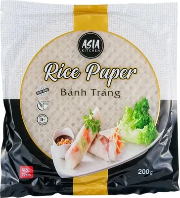 A package of rice paper with spring rolls and lettuce on a plate.