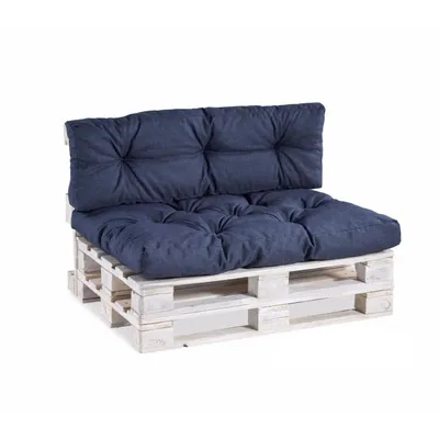 A dark blue pallet sofa cushion set on a white wooden pallet, isolated on a white background.