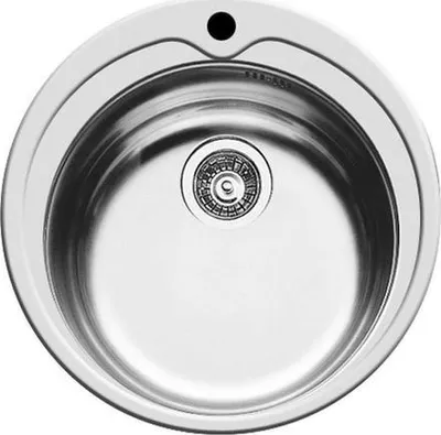 A top-down view of a round stainless steel sink with a black drain.