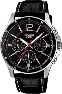 A close-up studio shot of a men's Casio watch with a black dial and black leather strap.