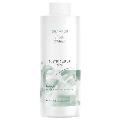A white bottle of Wella Professionals Nutricurls Waves Shampoo against a white background.