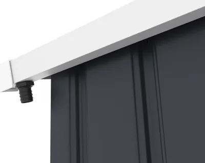 A close-up view of a gutter attachment on a metal shed.
