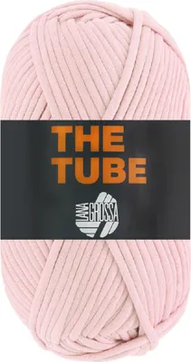 A ball of pink yarn with a black label.