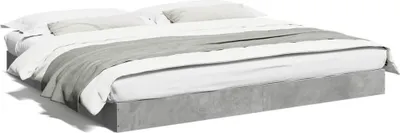 A bed frame with bedding.