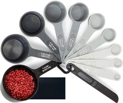 Produktbild von Famanu Messbecher und Messlöffelset 11-teilig schwarz stapelbar mit Maßangaben