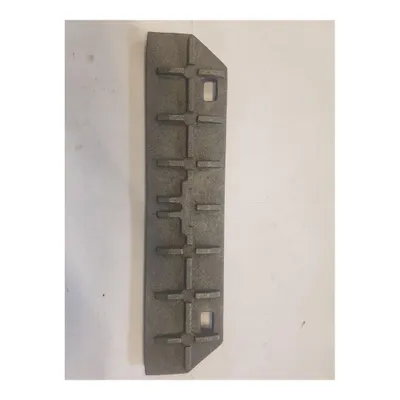 A single, gray, metallic object with a series of raised horizontal bars on a white background.