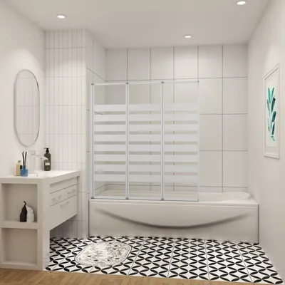 A modern bathroom with a bathtub and a shower screen.