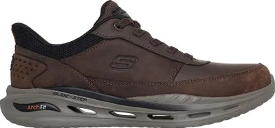 A side view of a brown Skechers men's sneaker.