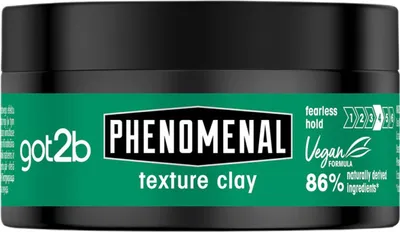 A product shot of a hair styling clay jar.