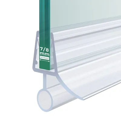 Close-up of a shower door seal with a measurement indicator.