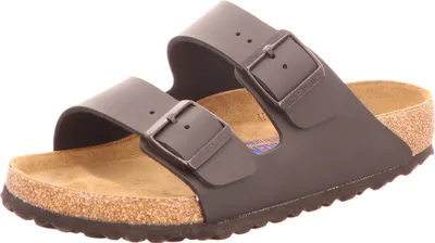 A pair of black Birkenstock Arizona sandals with cork soles.