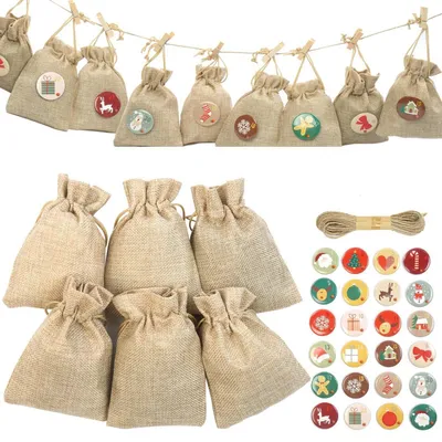 Image de Calendrier de l'Avent à remplir : 24 petits sacs en jute de 15x20 cm, couleur naturelle, avec des autocollants numérotés