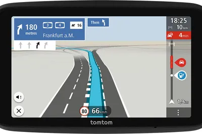 A close-up view of a TomTom navigation device displaying a map and route.