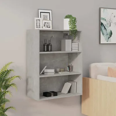 A gray wall-mounted shelf unit with various decorative items and books.